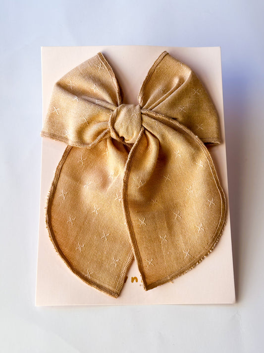 Tan linen bow