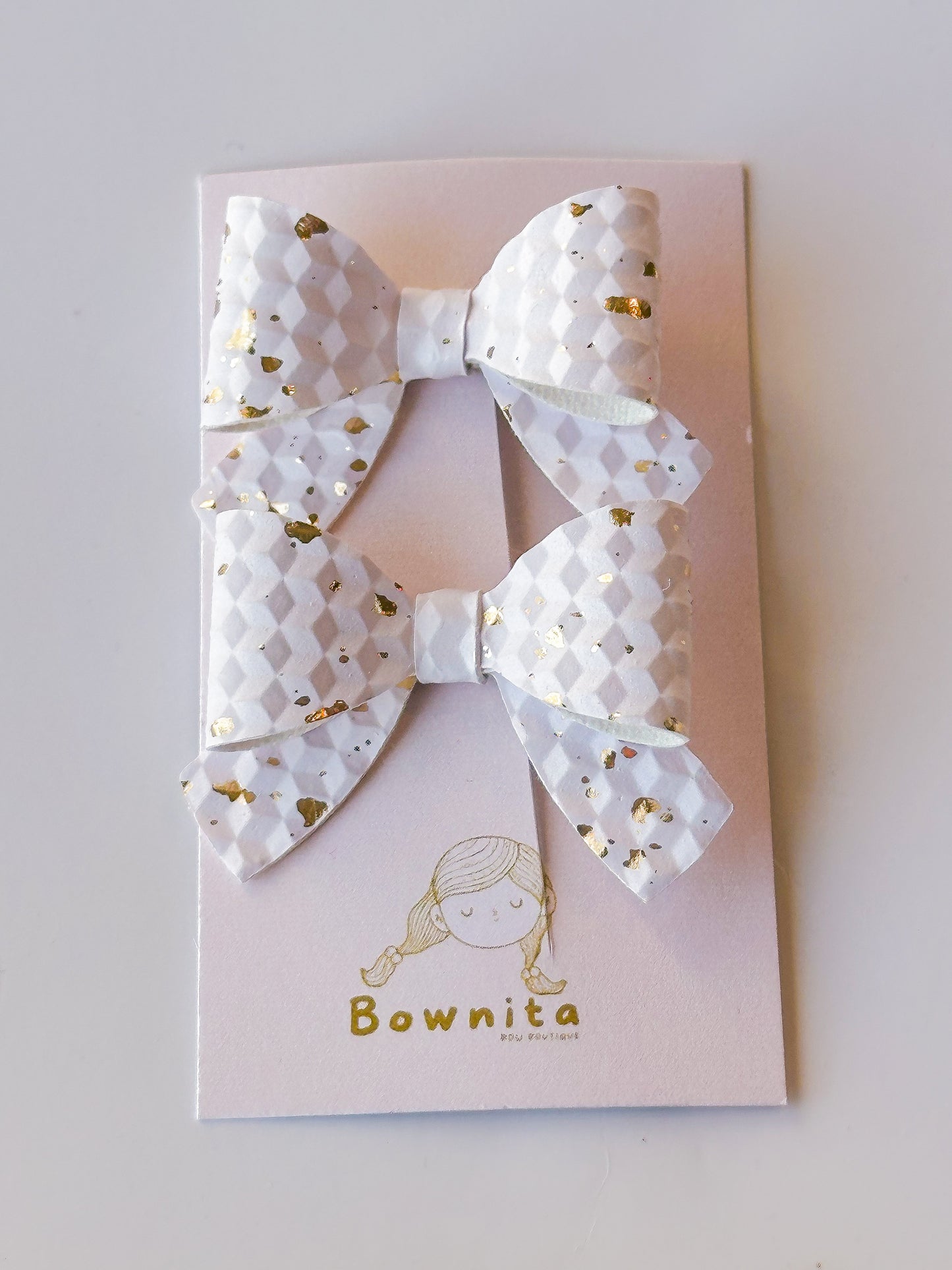 Textured white with gold foil bow set